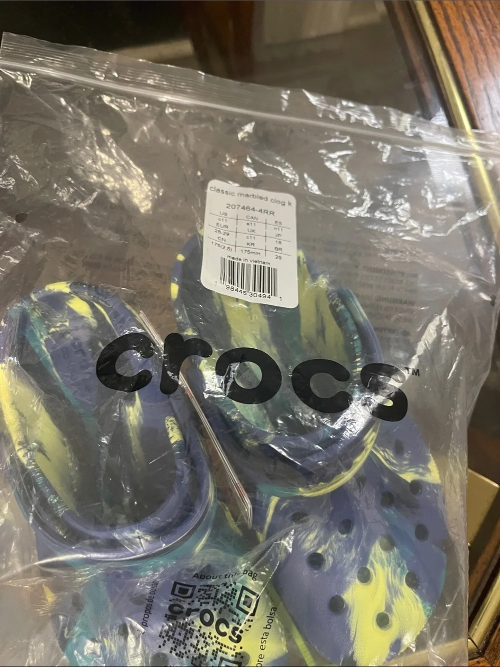 CROCS Kids' Swirl Clogs in Blue, Green & Yellow
